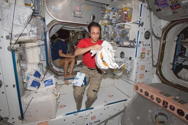NASA image: Expedition 32 Crew Members working in the Node 1