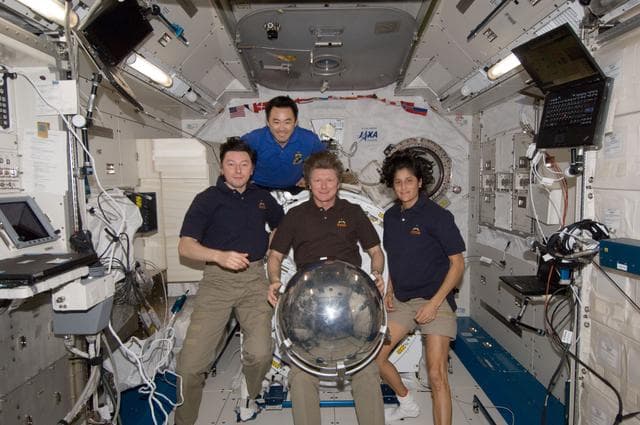 NASA image: ISS032 crewmembers with Sfera satellite in JPM