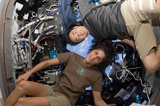 NASA image: Williams and Hoshide in Cuploa photographed for outreach project