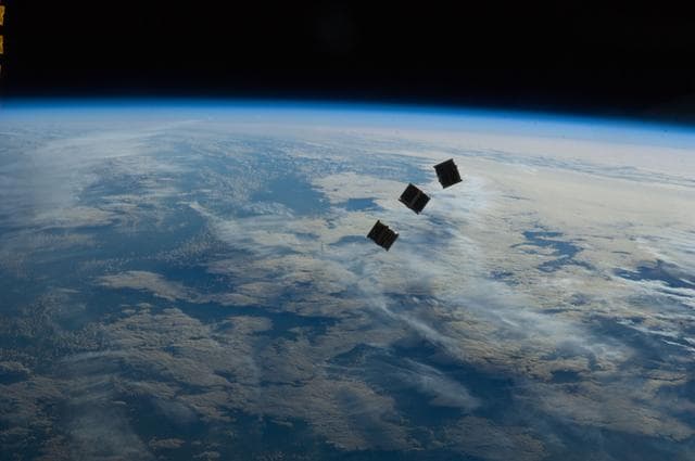 NASA image: Three small deployed satellites