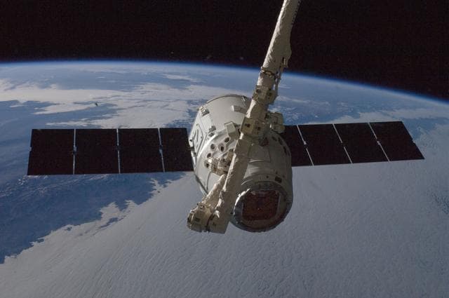 NASA image: Dragon grapple