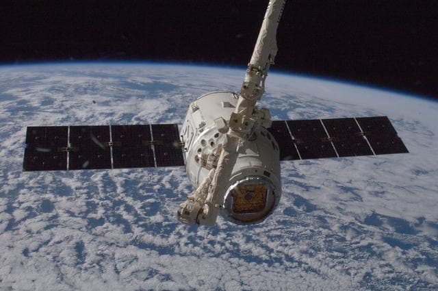 NASA image: Dragon grapple
