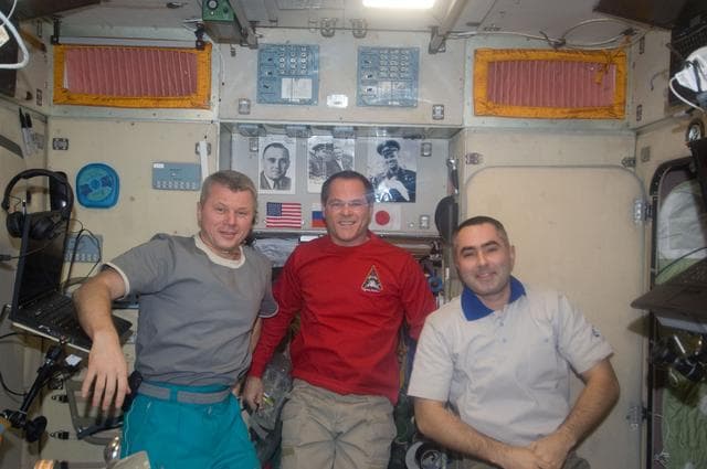 NASA image: Nivitskiy, Ford, and Tarelkin pose for photo in the SM