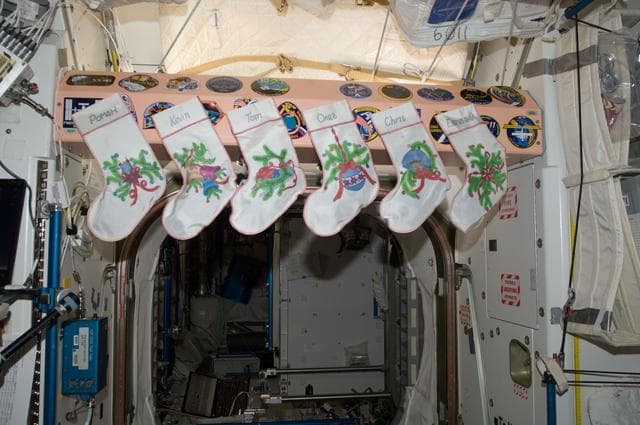 NASA image: Expedition 34 Christmas stockings at the Node 1 hatch