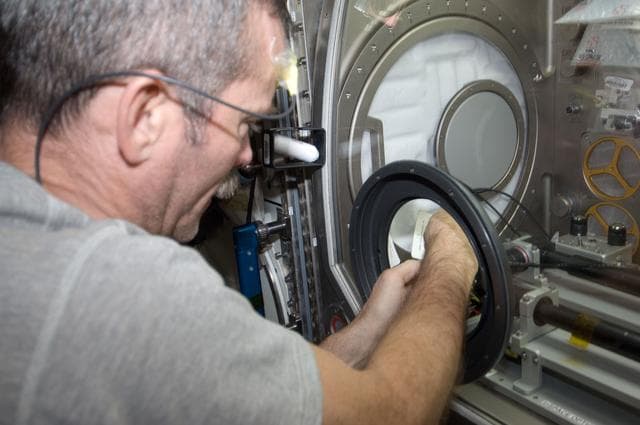 NASA image: Hadfield works with the InSPACE expeirment