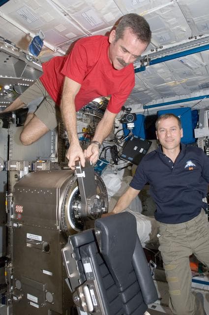 NASA image: Hadfield and Marshburn work on the MARES in the Columbus Module