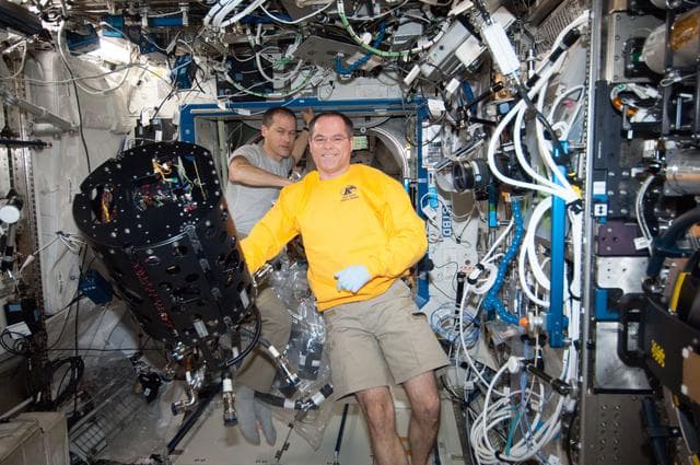 NASA image: Ford and Marshburn works at the CIR MDCA in the U.S. Laboratory