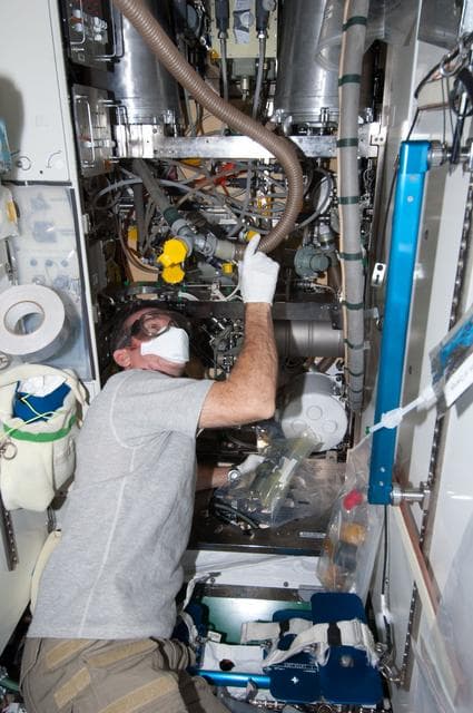 NASA image: Hadfield performs WHC overhaul in the Node 3