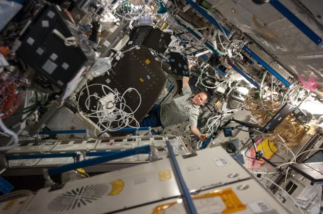 NASA image: Ford installs a UBNT sensor kit in the U.S. Laboratory