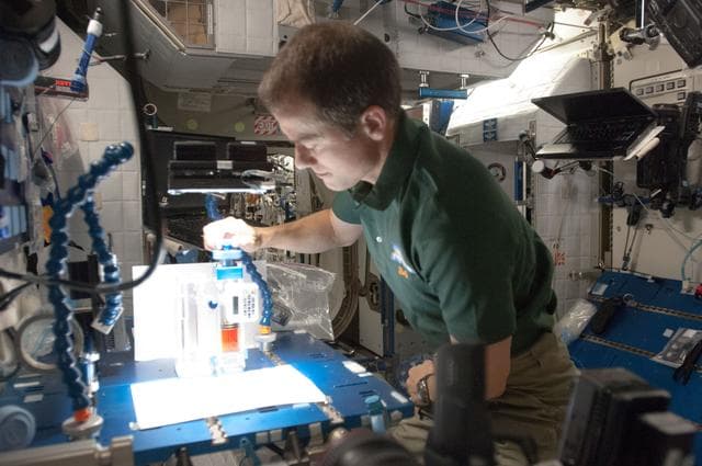 NASA image: Marshburn works with the CFE-3