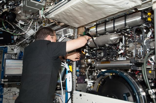 NASA image: Marshburn services the CIR in the U.S. Laboratory