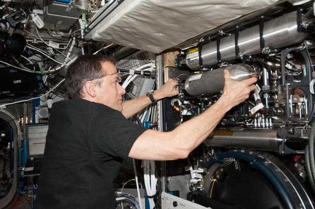 NASA image: Marshburn services the CIR in the U.S. Laboratory