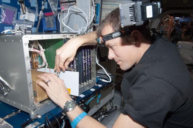NASA image: Marshburn performs in-flight maintenance to APS in the U.S. Laboratory