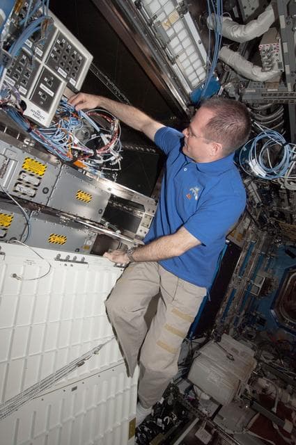 NASA image: Ford reconfigures cables for the JSL Area Network
