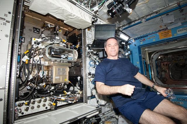 NASA image: Ford poses at the FIR/LMM/ACE in the U.S. Laboratory
