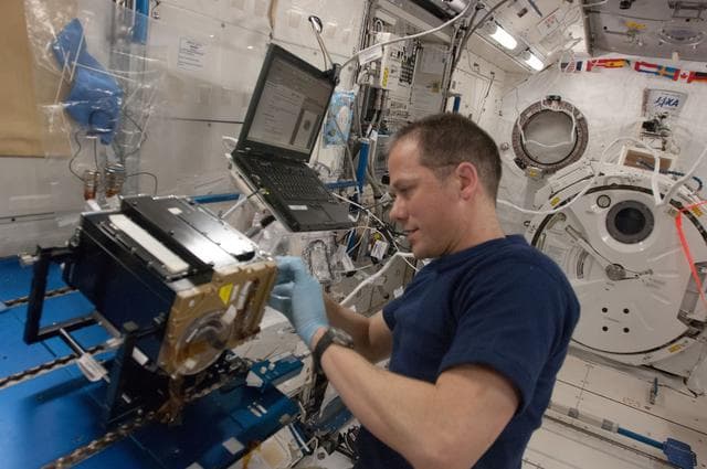 NASA image: Marshburn works with Marangoni Experiment Hardware in Kibo