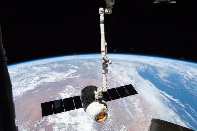NASA image: Unberthed Dragon CRS-2 grappled by SSRMS