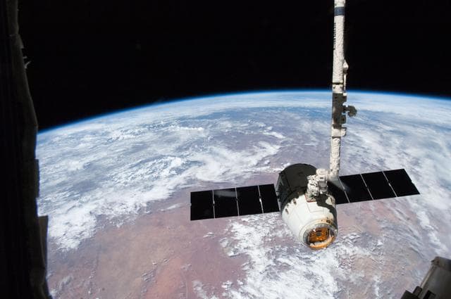 NASA image: Unberthed Dragon CRS-2 grappled by SSRMS