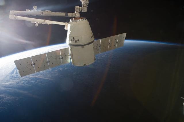 NASA image: Unberthed Dragon CRS-2 grappled by SSRMS