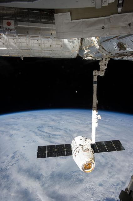 NASA image: Unberthed Dragon CRS-2 grappled by SSRMS