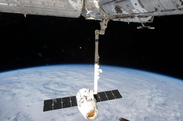 NASA image: Unberthed Dragon CRS-2 grappled by SSRMS