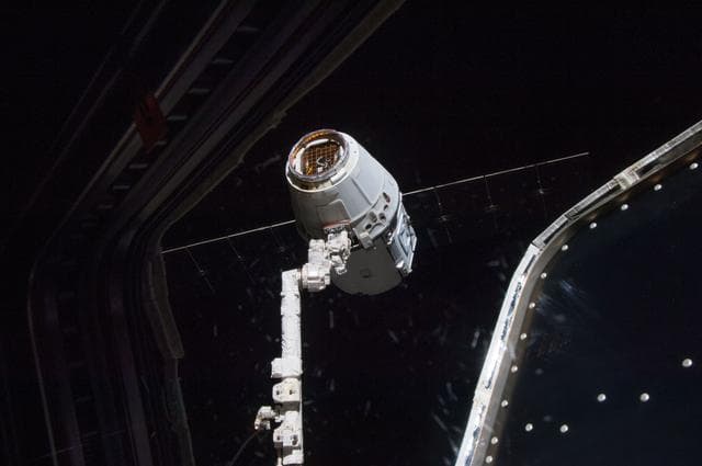NASA image: Unberthed Dragon CRS-2 grappled by SSRMS