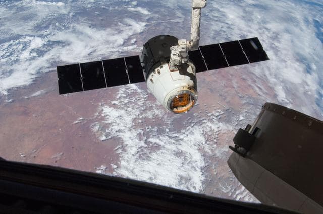 NASA image: Unberthed Dragon CRS-2 grappled by SSRMS