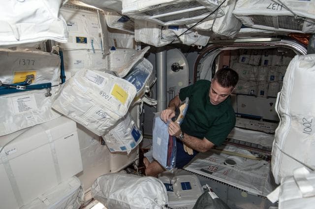 NASA image: Cassidy works with Stowage in PMM