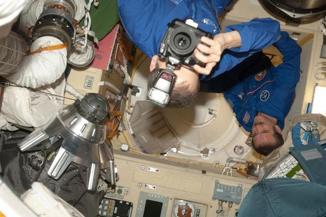 NASA image: Marshburn and Hadfield in MRM2 prior to Hatch Opening