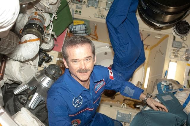 NASA image: Hadfield and Marshburn in MRM2 prior to Hatch Opening