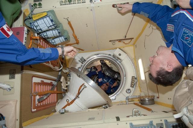 NASA image: Crewmembers in MRM2 following Soyuz TMA-08M/34S Hatch Opening