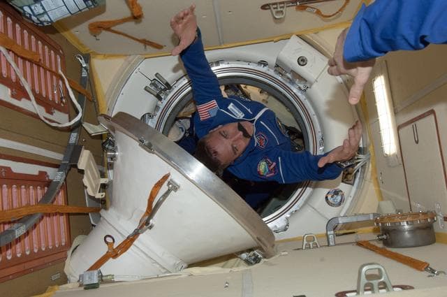 NASA image: Crewmembers in MRM2 following Soyuz TMA-08M/34S Hatch Opening