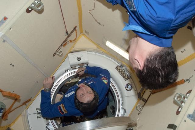 NASA image: Crewmembers in MRM2 following Soyuz TMA-08M/34S Hatch Opening