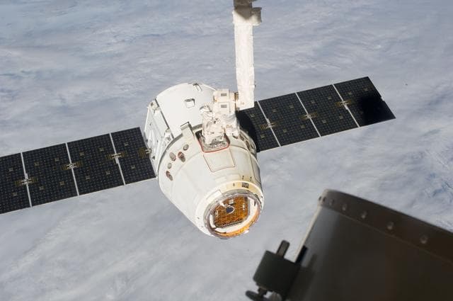 NASA image: Unberthed Dragon CRS-2 grappled by SSRMS