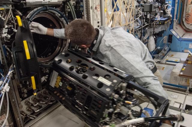 NASA image: Cassidy conducts MDCA Fuel Reservoir Remove and Replace OPS