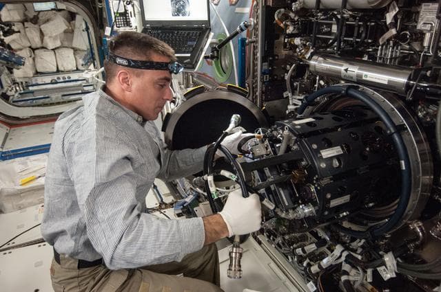 NASA image: Cassidy conducts MDCA Fuel Reservoir Remove and Replace OPS