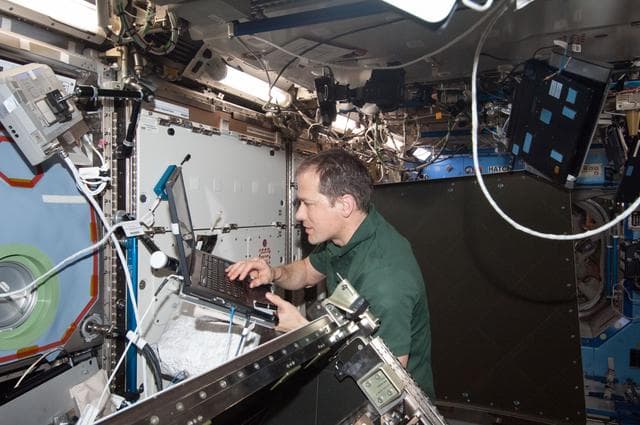 NASA image: Marshburn during HRCS Ku Comm Unit 1 Installation