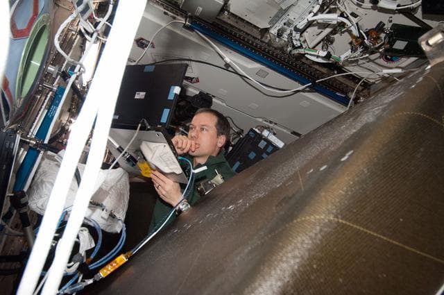 NASA image: Marshburn during HRCS Ku Comm Unit 1 Installation