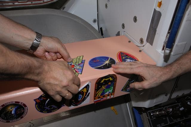 NASA image: Exp 35 sticker placement on undocking day