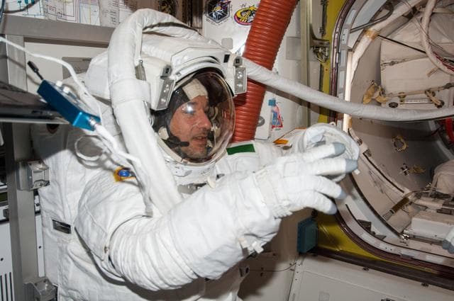 NASA image: EVA 23 prep in the Quest airlock