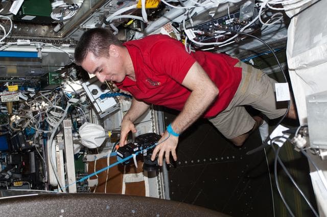 NASA image: Cassidy in Lab with camera