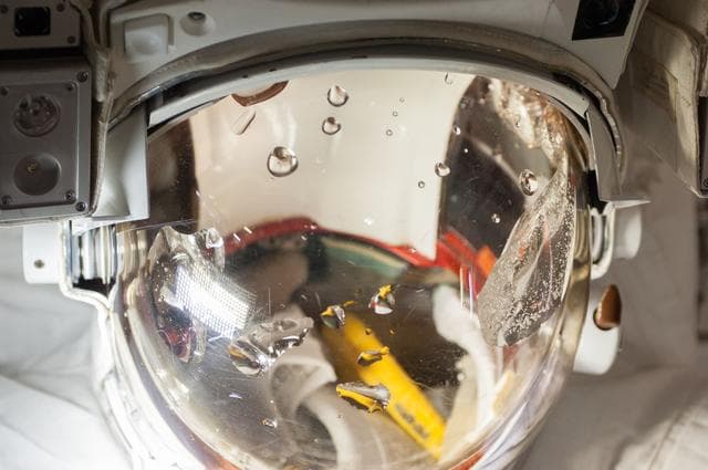 NASA image: Quest airlock with malfunctioning EMU