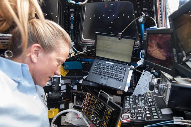 NASA image: Nyberg at controls in Cupola