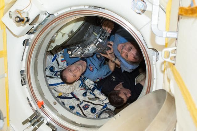 NASA image: Vinogradov, Cassidy and Misurkin in Soyuz TMA-08M