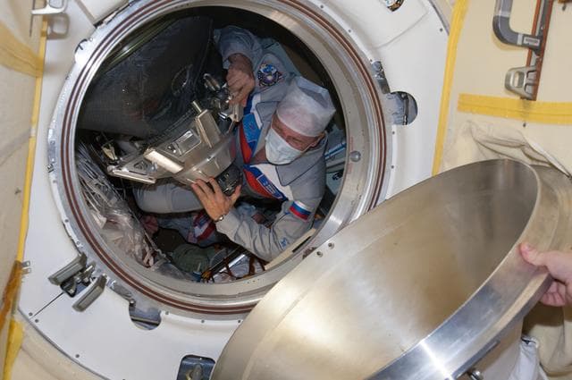 NASA image: Soyuz TMA-10M spacecraft hatch opening