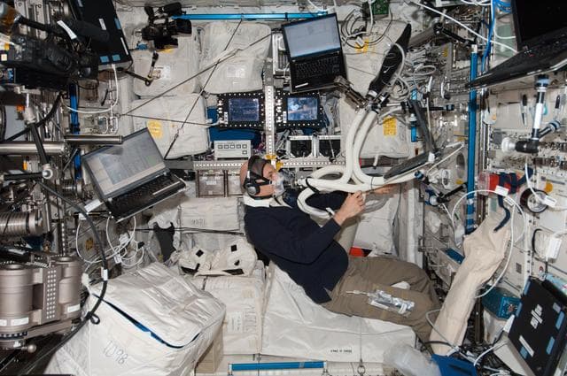 NASA image: Parmitano in Columbus module during Oxygen Uptake measurement session