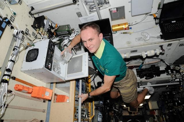 NASA image: CASKAD. Manual Mixing in Bioreactor
