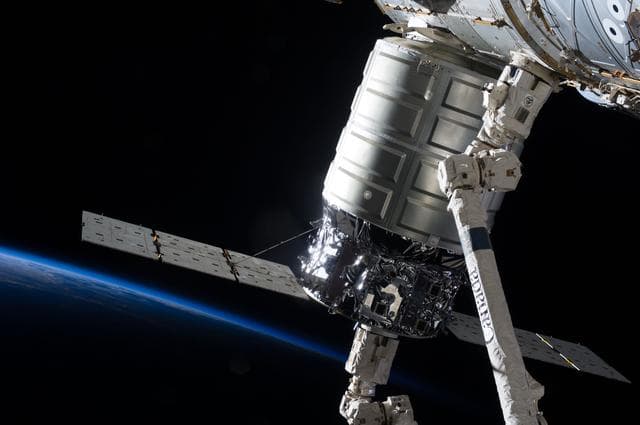 NASA image: Cygnus and  Canadarm2.