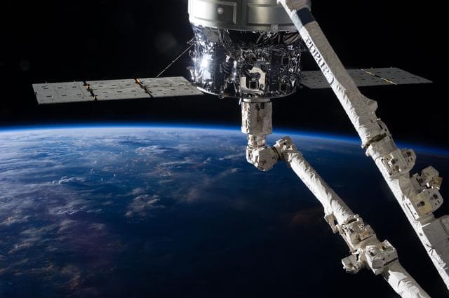 NASA image: Cygnus and  Canadarm2.