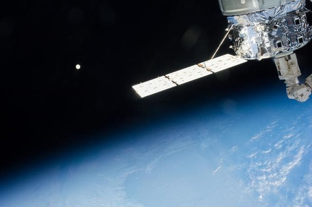 NASA image: View of Moon over Earth limb taken by the Expedition 37 crew.